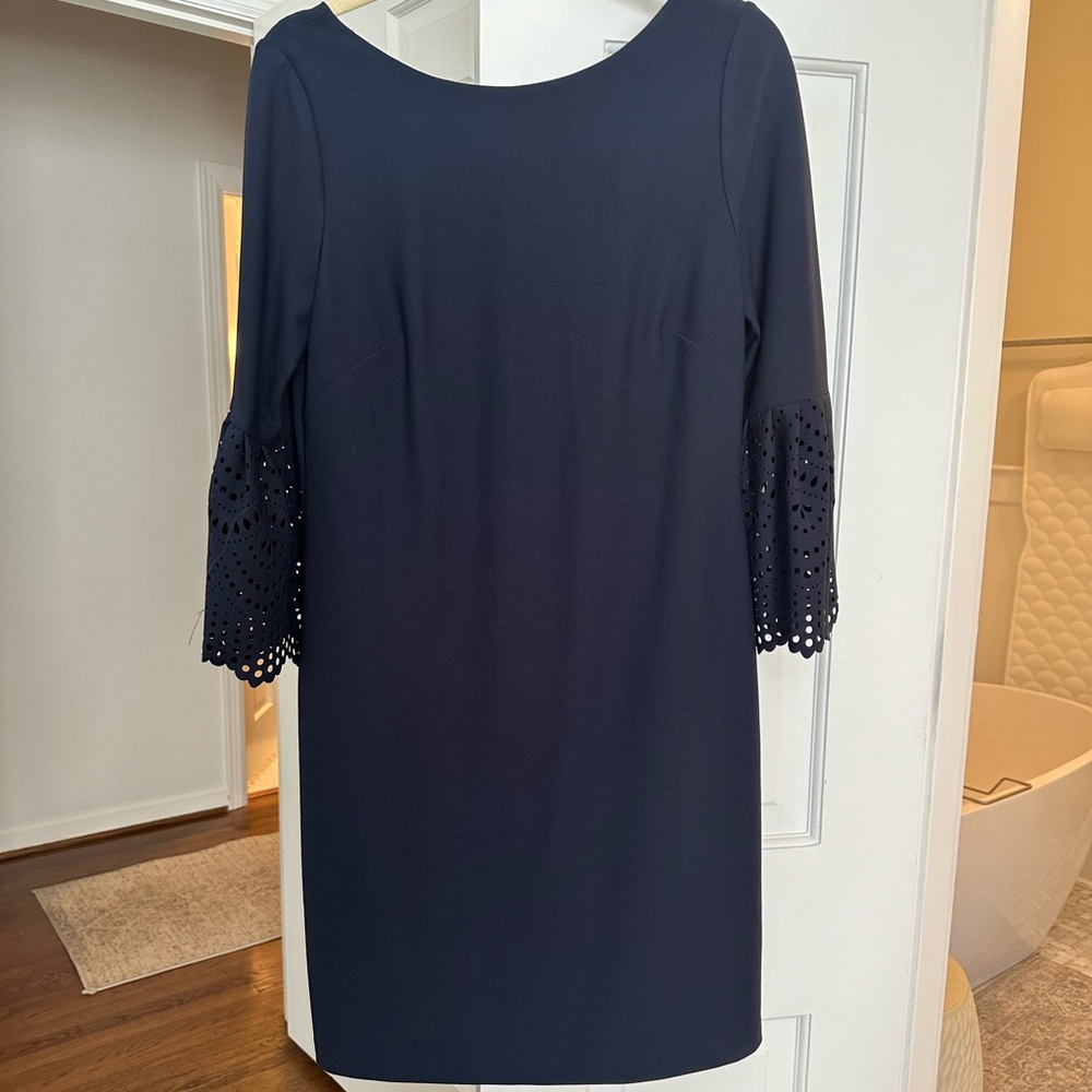 Classic navy dress with fun sleeves